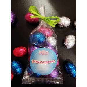 SACHET OEUF DE PAQUES PRALINES LAIT/BLANC DE 134 G